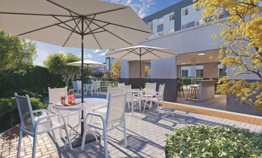 Area lazer externa churrasqueira mesas