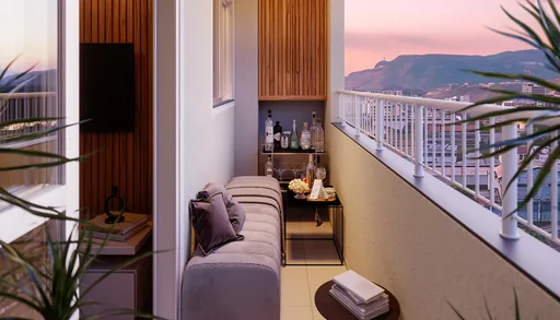 Varanda decorada vista montanha por do sol