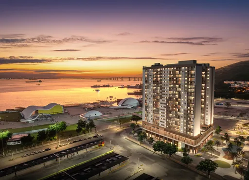 Fachada empreendimento vista beira mar por do sol